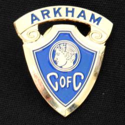 Varsity pin: Arkham Chamber of Commerce